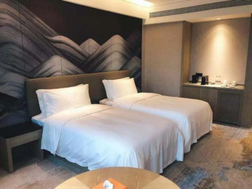 Bed in Yinhu Junyi Hotel（Wildlife Park）