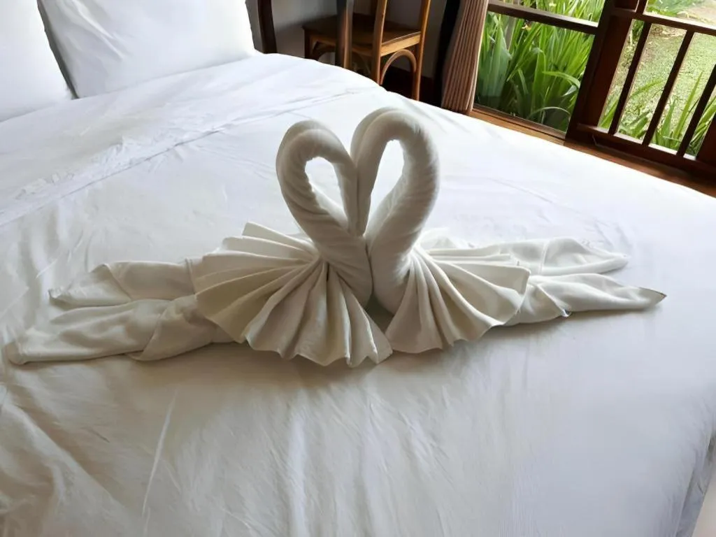 Bed in Gin's Greenery Resort