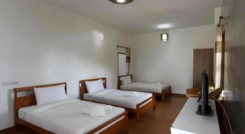 Bed in Gin's Greenery Resort