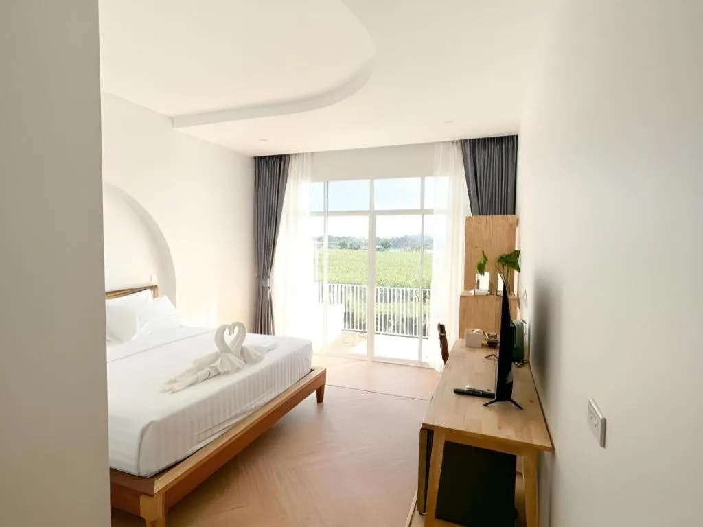 Bed in Gin's Greenery Resort