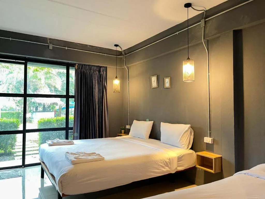 Bed in Warehouse18 Pool Cafe Resort