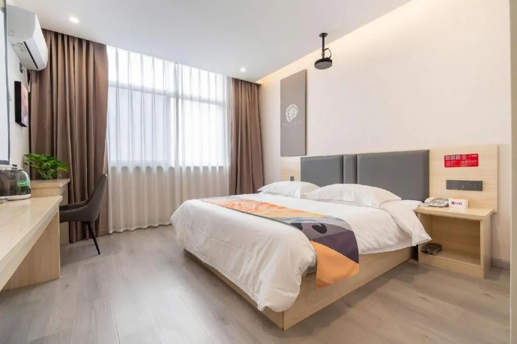 Bed in Shell Hotel Wuxi Huishan District Chang'an Town