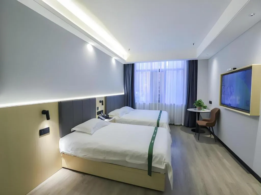 Bed in GreenTree Inn Express Fuyang University Town West High-Speed Railway Station