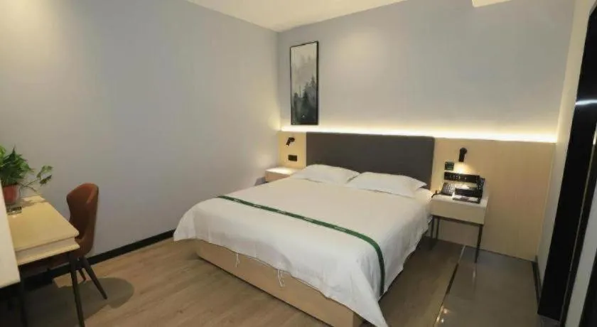 Bed in GreenTree Inn Express Fuyang University Town West High-Speed Railway Station