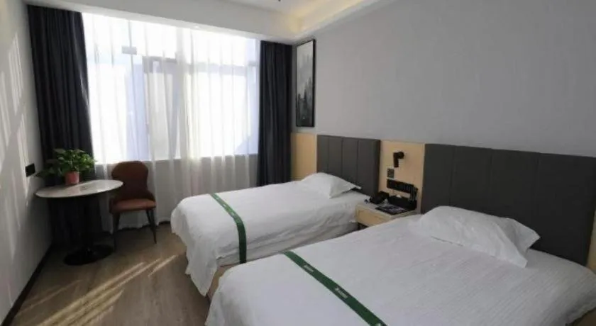 Bed in GreenTree Inn Express Fuyang University Town West High-Speed Railway Station