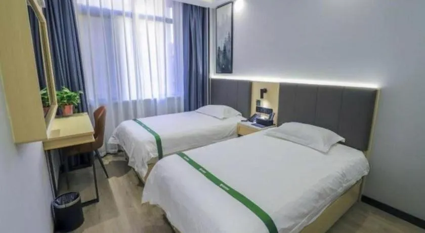 Bed in GreenTree Inn Express Fuyang University Town West High-Speed Railway Station