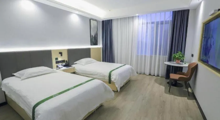 Bed in GreenTree Inn Express Fuyang University Town West High-Speed Railway Station