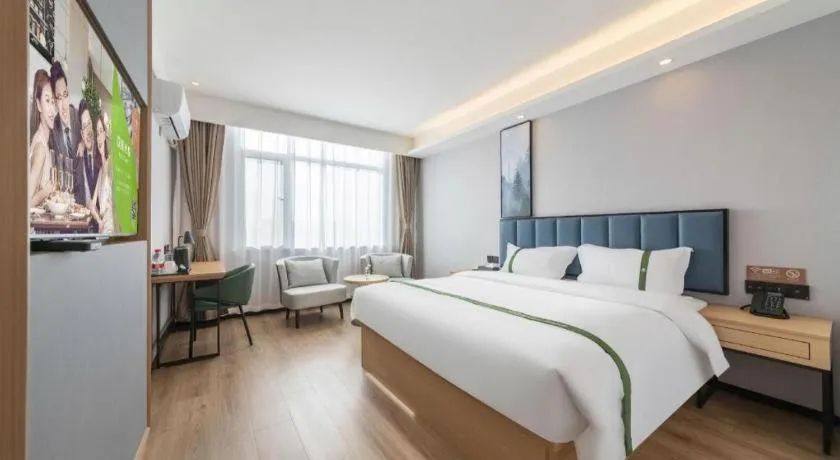 Bed in GreenTree Inn Express Qingdao Jiaodong International Airport