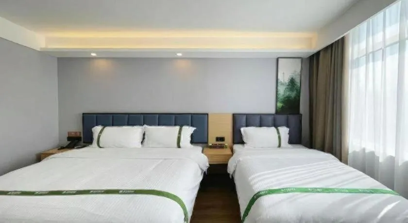 Bed in GreenTree Inn Express Qingdao Jiaodong International Airport