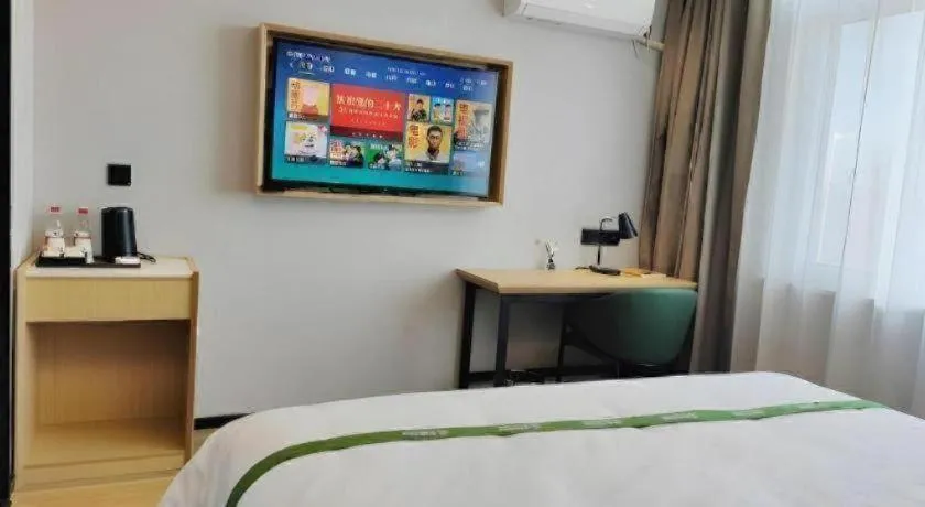Bed in GreenTree Inn Express Qingdao Jiaodong International Airport