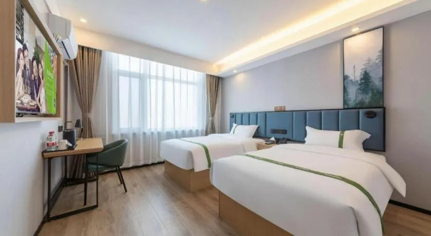 Bed in GreenTree Inn Express Qingdao Jiaodong International Airport