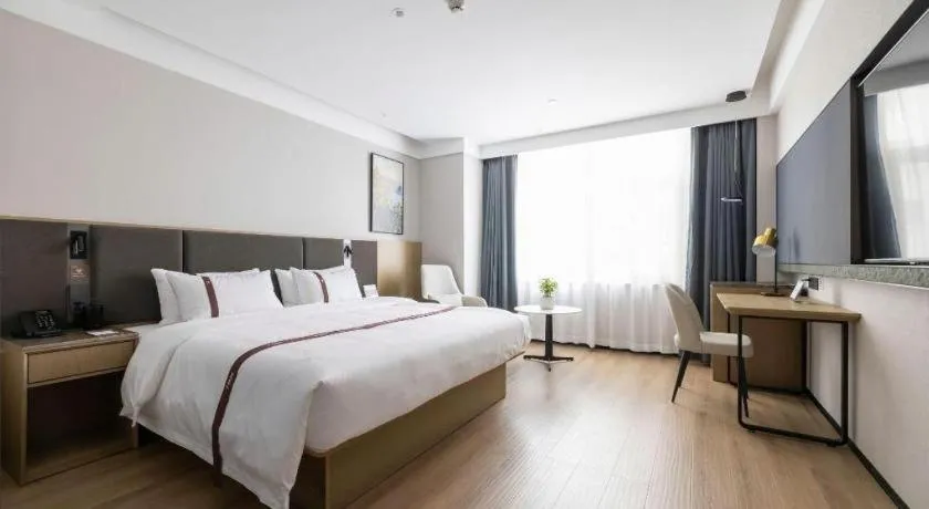 Bed in GYA Hotel Taiyuan Jinyang Street Grand Shanxi Hospital