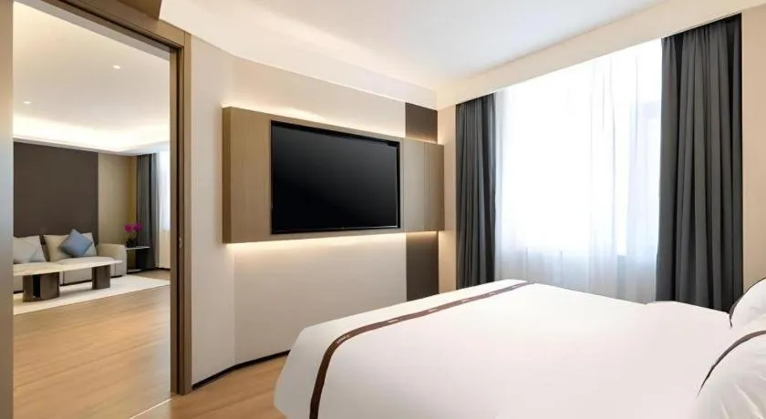 Bed in GYA Hotel Taiyuan Jinyang Street Grand Shanxi Hospital