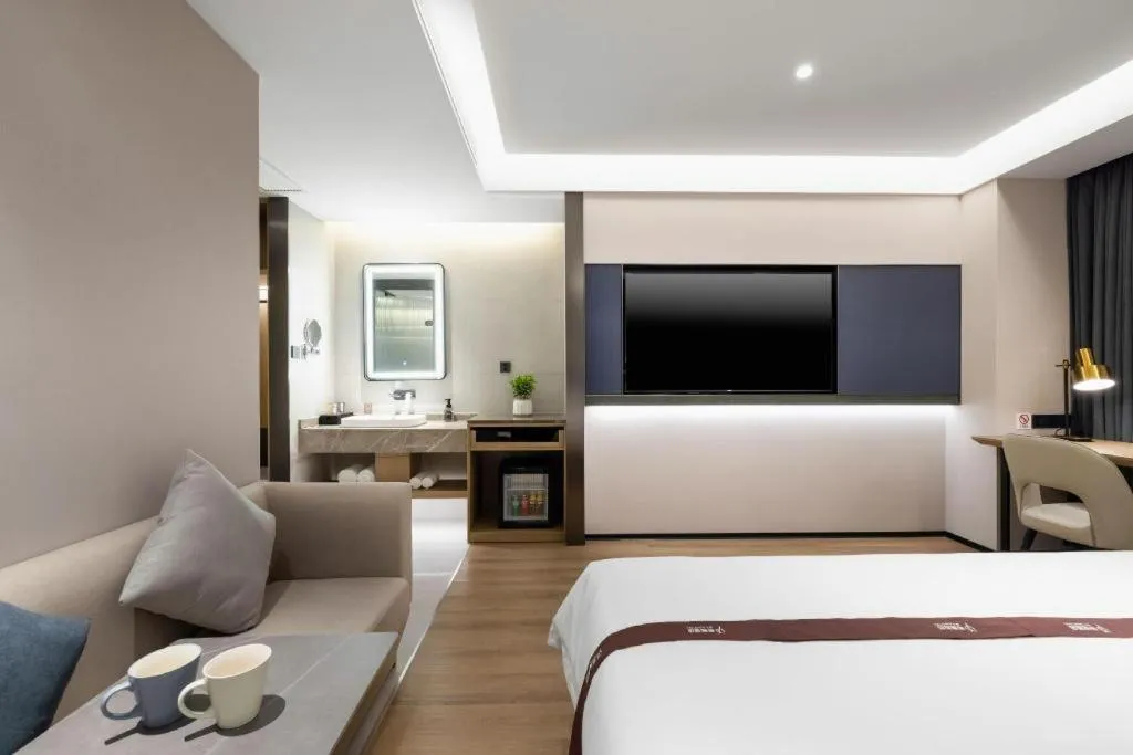 Bed in GYA Hotel Taiyuan Jinyang Street Grand Shanxi Hospital