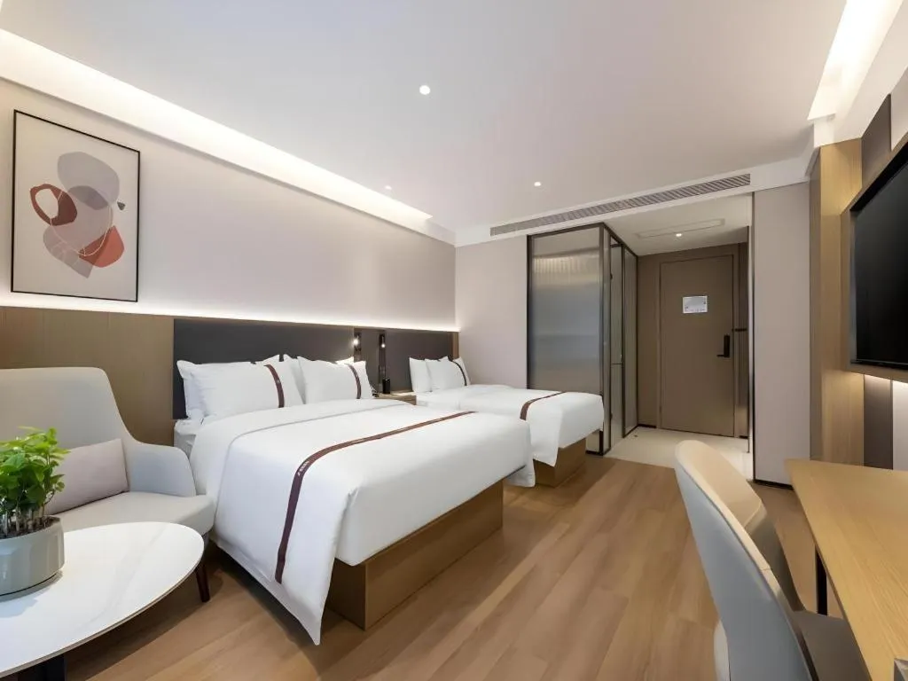 Bed in GYA Hotel Taiyuan Jinyang Street Grand Shanxi Hospital