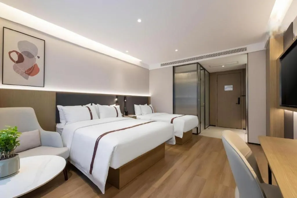 Bed in GYA Hotel Taiyuan Jinyang Street Grand Shanxi Hospital