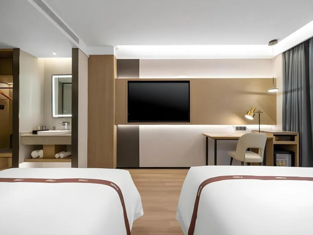 Bed in GYA Hotel Taiyuan Jinyang Street Grand Shanxi Hospital