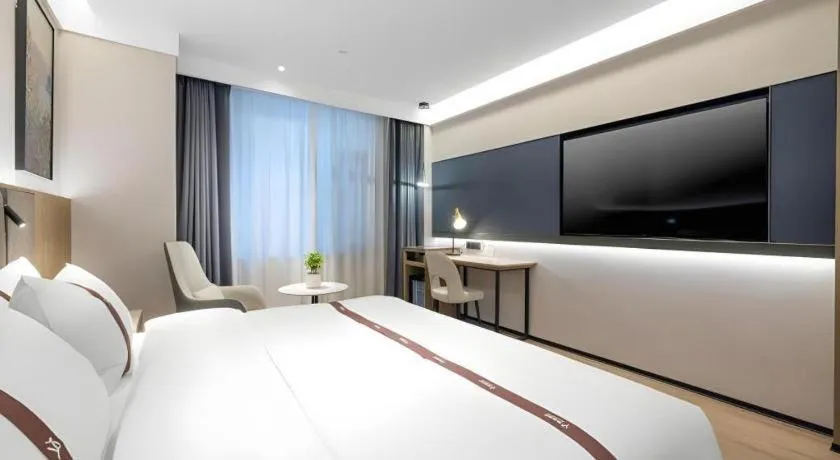 Bed in GYA Hotel Taiyuan Jinyang Street Grand Shanxi Hospital