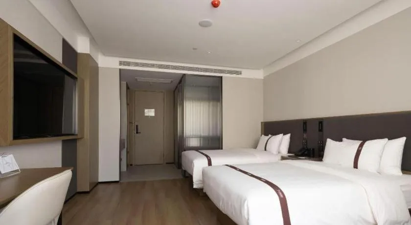 Bed in GYA Hotel Taiyuan Jinyang Street Grand Shanxi Hospital