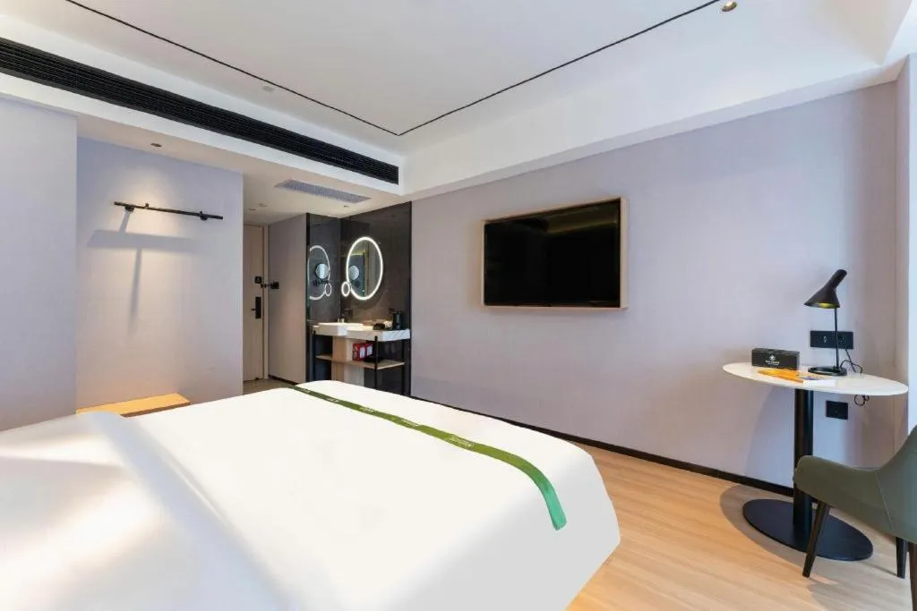 Bed in GreenTree Inn Jinan West Station Exhibition Center