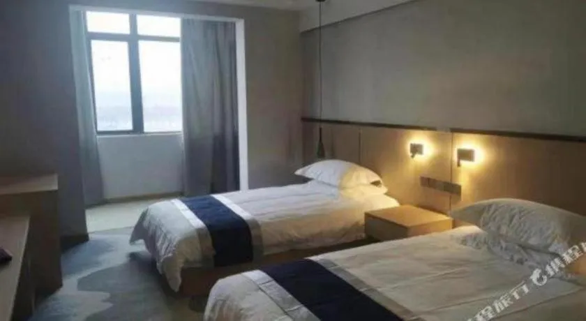 Bed in GELI Hotel Huainan Railway Station Sports Center