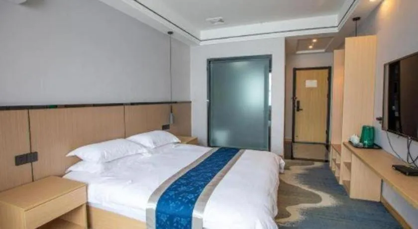 Bed in GELI Hotel Huainan Railway Station Sports Center