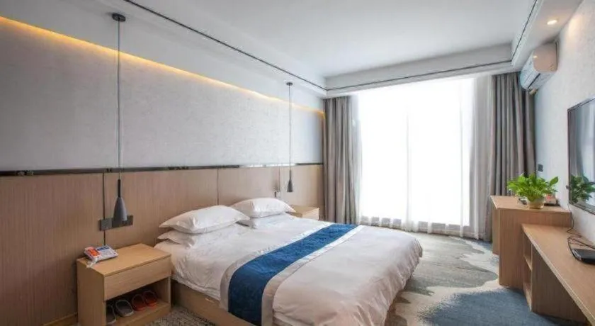 Bed in GELI Hotel Huainan Railway Station Sports Center