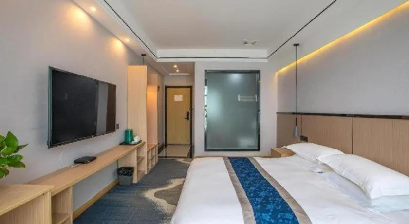 Bed in GELI Hotel Huainan Railway Station Sports Center