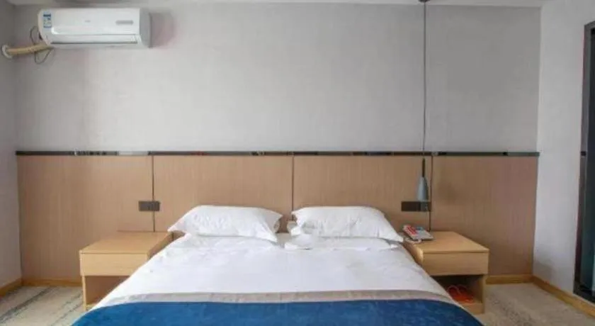 Bed in GELI Hotel Huainan Railway Station Sports Center