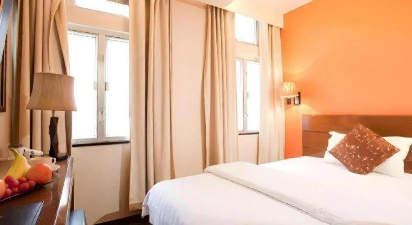 Bed in Sunny Day Hotel