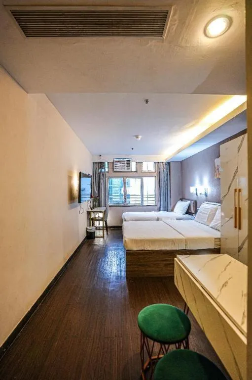 Bed in Sunny Day Hotel