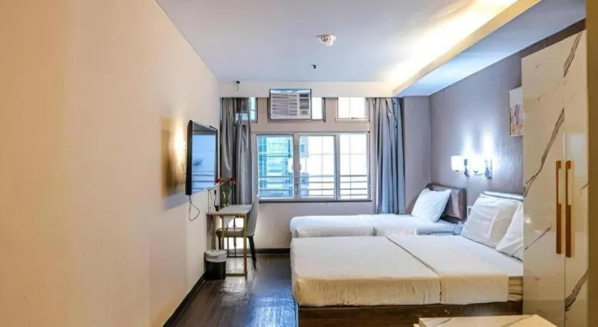 Bed in Sunny Day Hotel