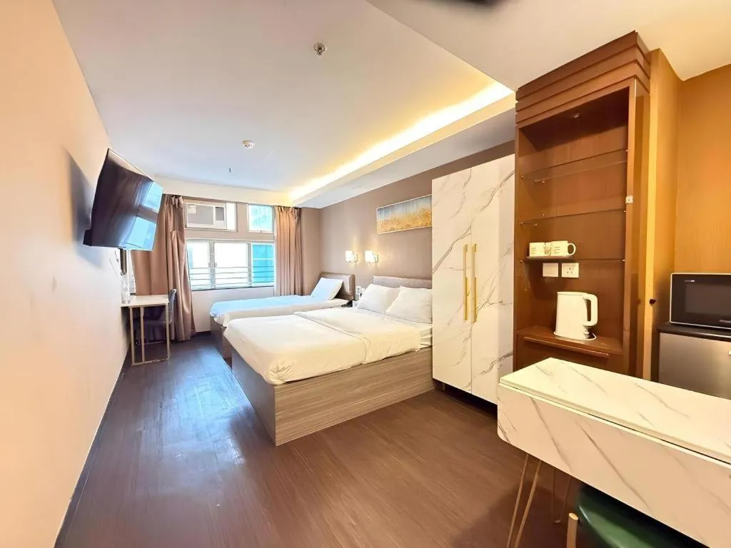 Bed in Sunny Day Hotel