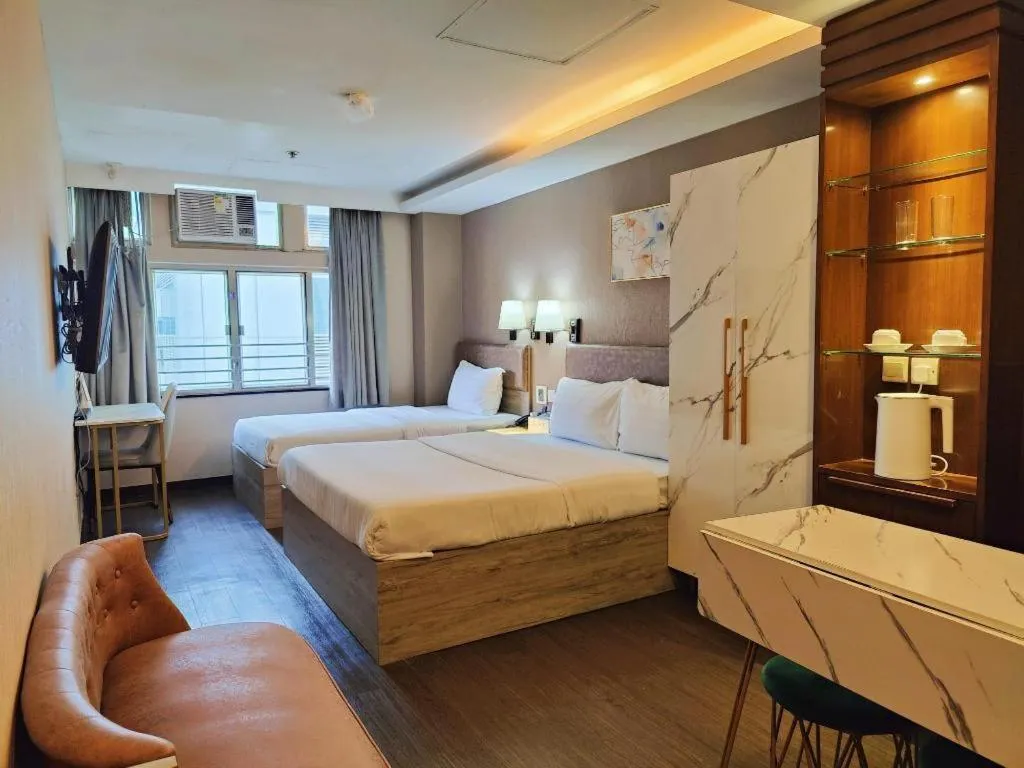 Bed in Sunny Day Hotel