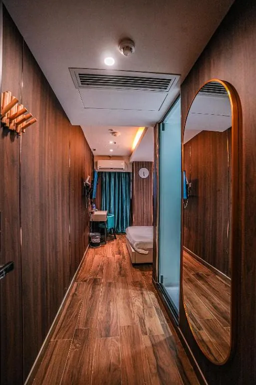 Bed in Sunny Day Hotel