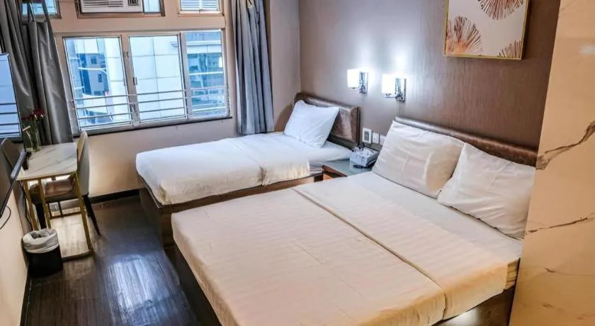 Bed in Sunny Day Hotel