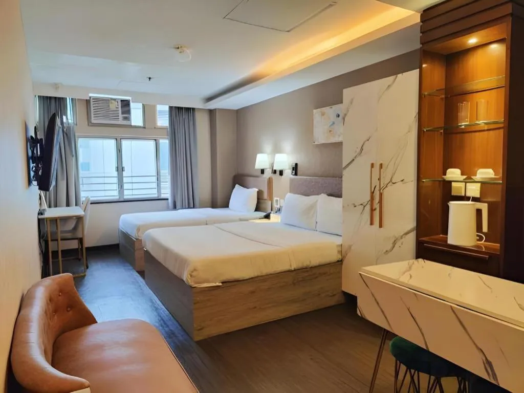 Bed in Sunny Day Hotel