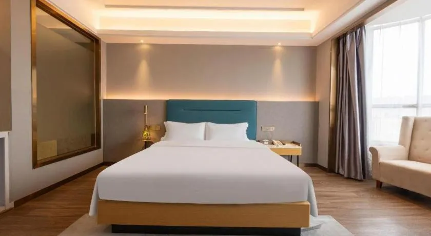 Bed in Cheermay Hotels