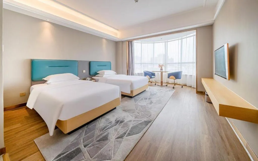 Bed in Cheermay Hotels