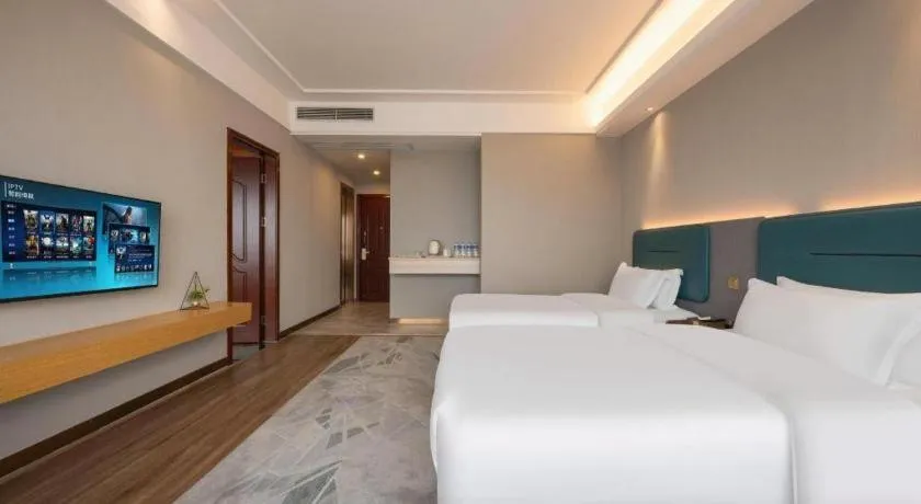 Bed in Cheermay Hotels