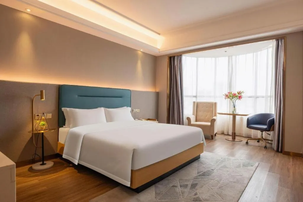 Bed in Cheermay Hotels