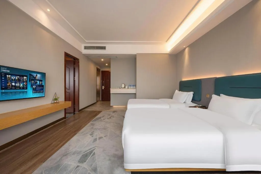 Bed in Cheermay Hotels