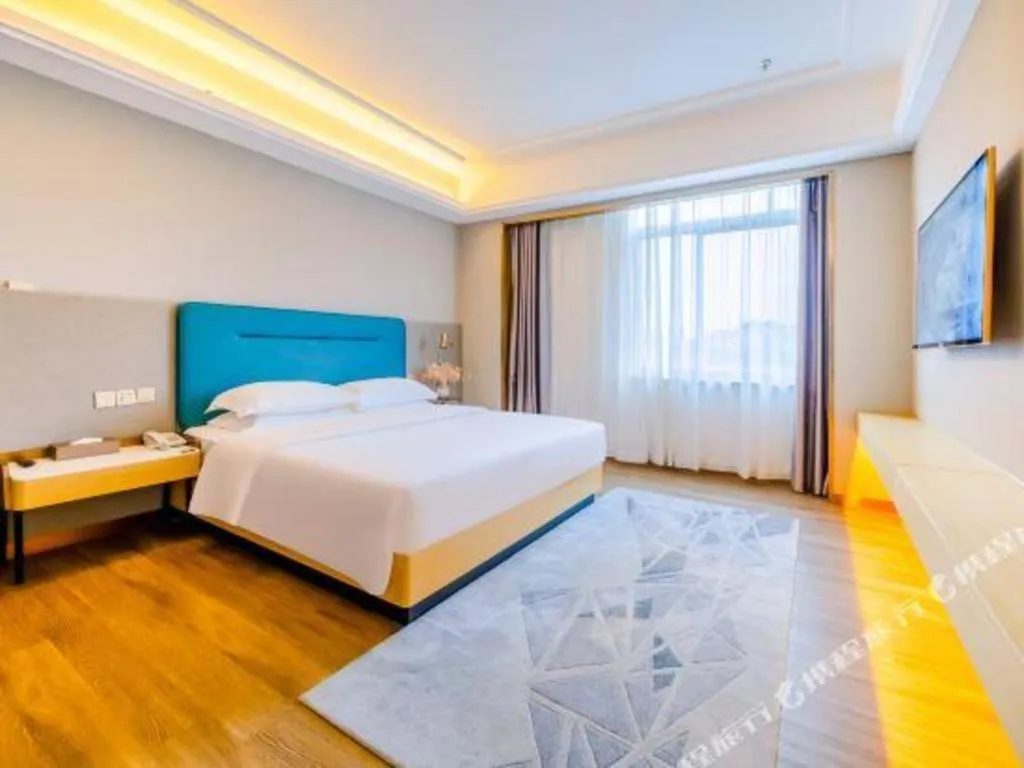 Bed in Cheermay Hotels