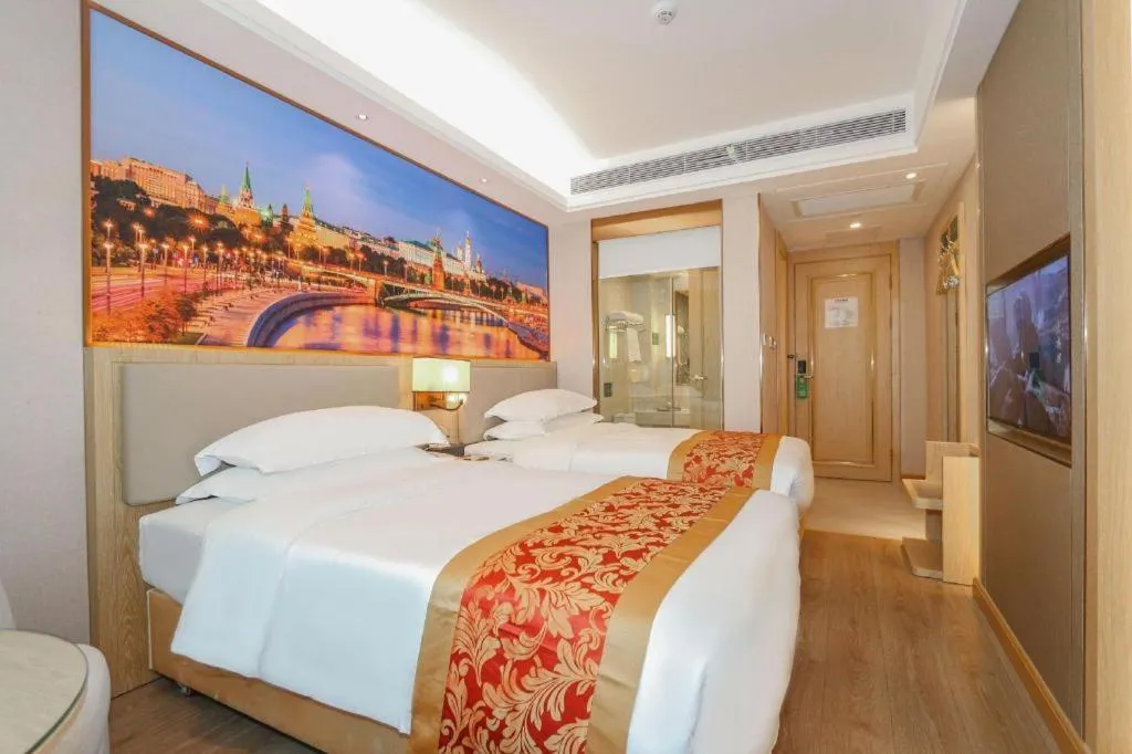 Bed in SHANGJINGHAO HOTEL （SAKATA SNOW ELEPHANT SUBWAY STATION SHOP）