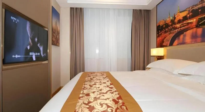 Bed in SHANGJINGHAO HOTEL （SAKATA SNOW ELEPHANT SUBWAY STATION SHOP）