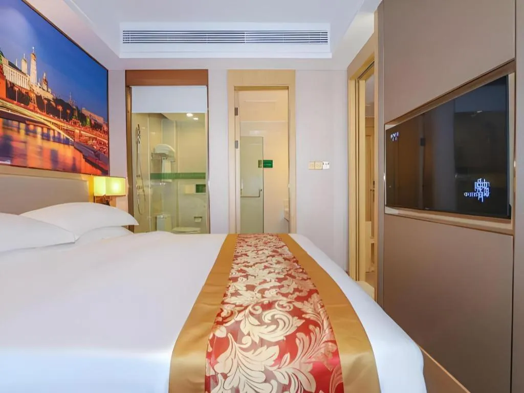 Bed in SHANGJINGHAO HOTEL （SAKATA SNOW ELEPHANT SUBWAY STATION SHOP）