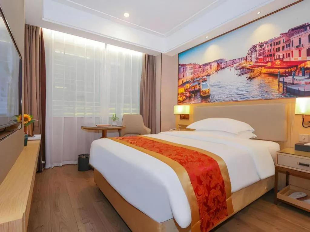 Bed in SHANGJINGHAO HOTEL （SAKATA SNOW ELEPHANT SUBWAY STATION SHOP）