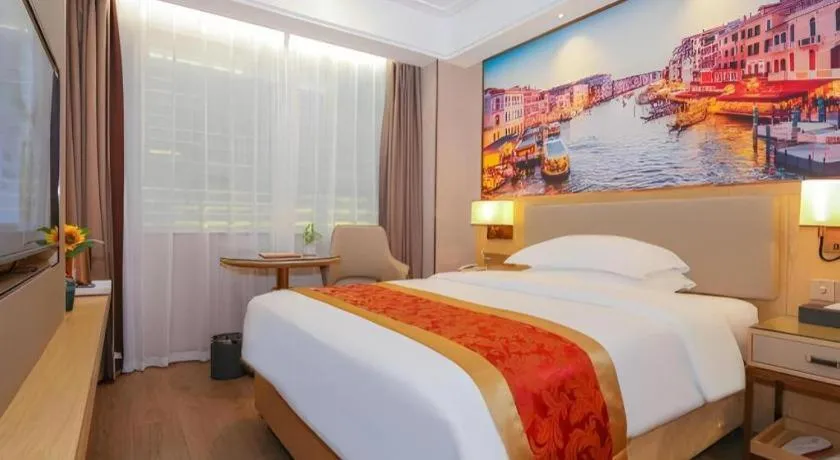 Bed in SHANGJINGHAO HOTEL （SAKATA SNOW ELEPHANT SUBWAY STATION SHOP）