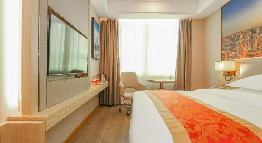 Bed in SHANGJINGHAO HOTEL （SAKATA SNOW ELEPHANT SUBWAY STATION SHOP）
