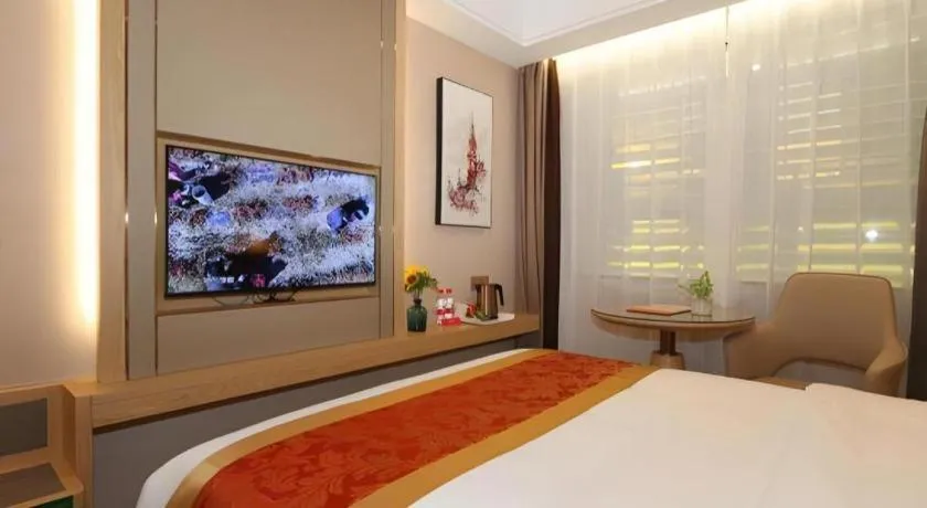 Bed in SHANGJINGHAO HOTEL （SAKATA SNOW ELEPHANT SUBWAY STATION SHOP）